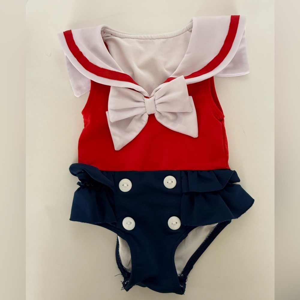 Little Lamb&Co Red and Navy Sailor Baby Swims Mila embroidered on back 0/6 month